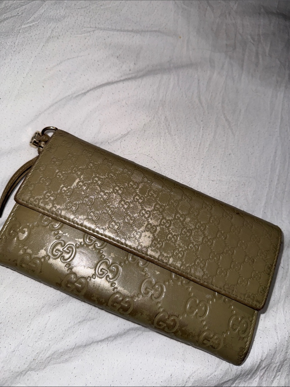 Gucci Metallic Gold GG Embossed Leather Clutch